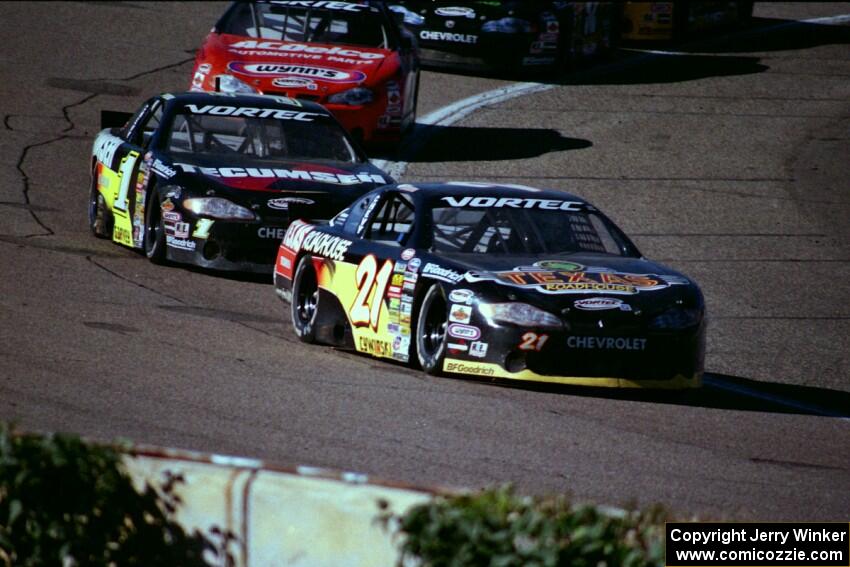 (21) Kevin Cywinski's Chevy Monte Carlo, (1) Mike Garvey's Chevy Monte Carlo and (7) Gary St. Amant's Chevy Monte Carlo