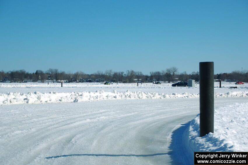 A view of the track from inside of an iceracing car.