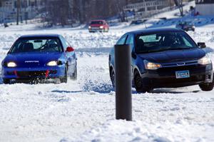 Russ Lupinek's Ford Focus and Frank Giegler / Mark Utecht Honda Civic