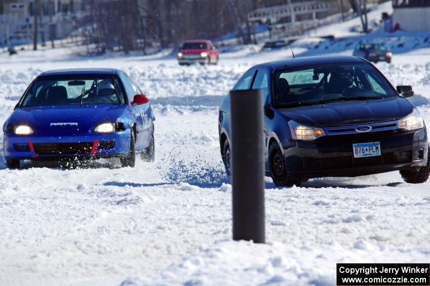 Russ Lupinek's Ford Focus and Frank Giegler / Mark Utecht Honda Civic