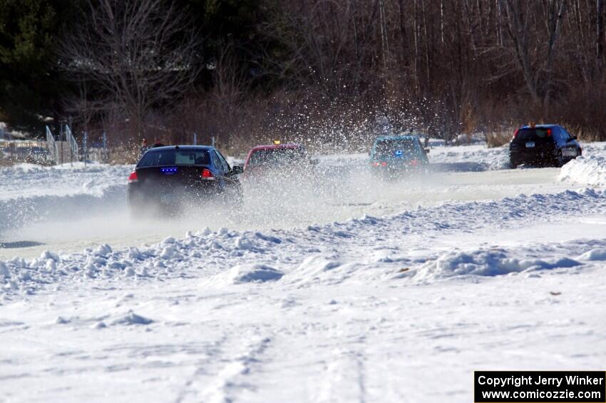 Chris Kleinhuizen's Ford Focus gets stuck in the first corner.