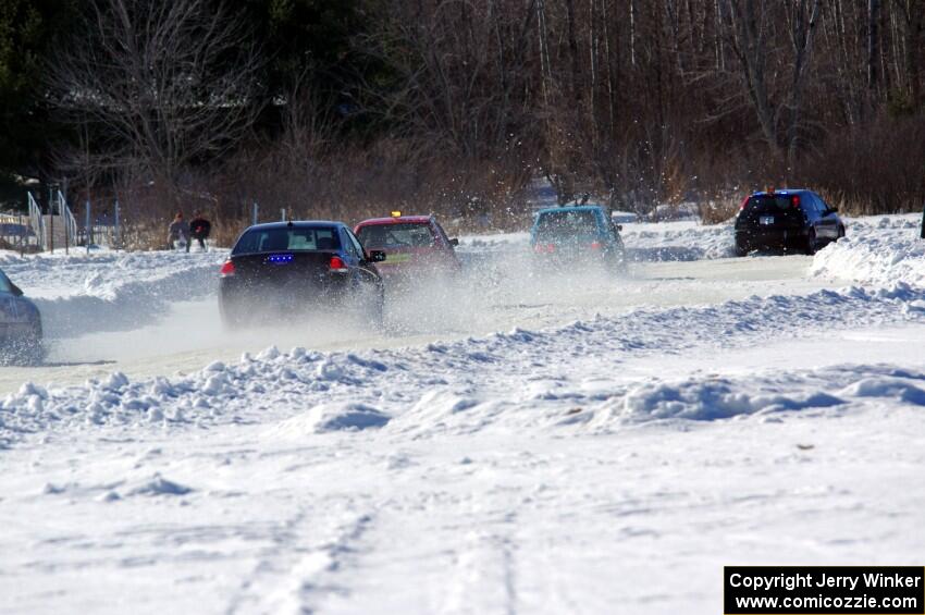 Chris Kleinhuizen's Ford Focus gets stuck in the first corner.