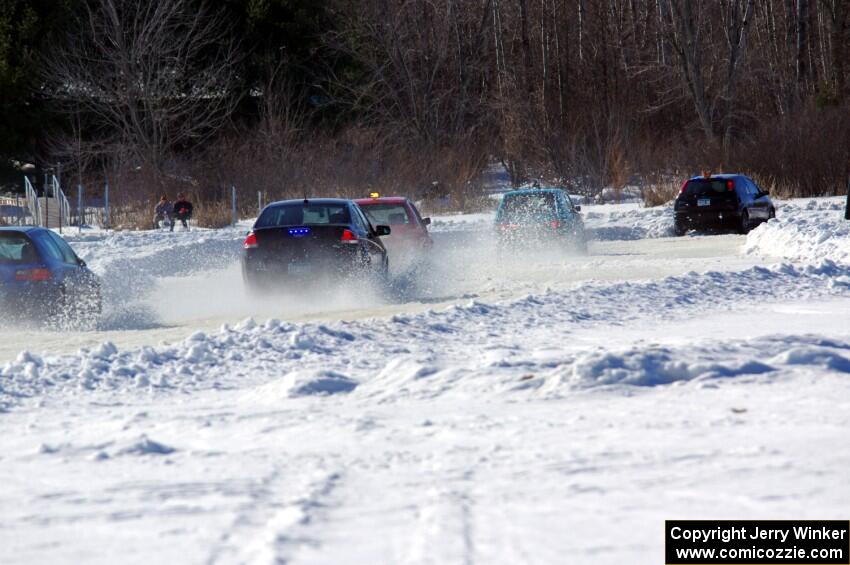 Chris Kleinhuizen's Ford Focus gets stuck in the first corner.