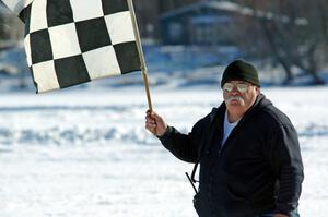 Bill Gibson works the flags.