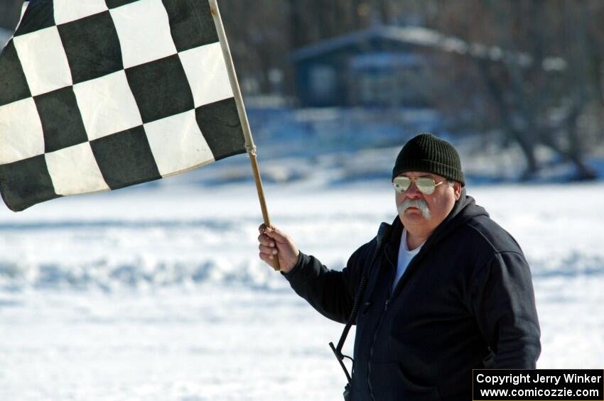 Bill Gibson works the flags.