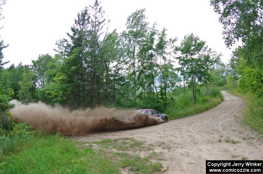 Travis Pastrana / Robbie Durant Subaru WRX STi at a sharp left on SS3, Steamboat I.