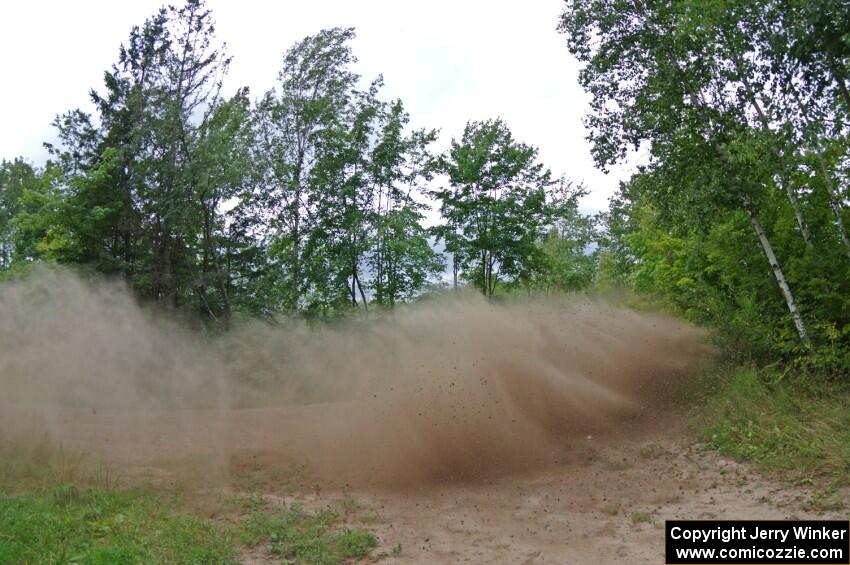 Travis Pastrana / Robbie Durant Subaru WRX STi at a sharp left on SS3, Steamboat I.