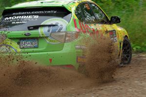 Lauchlin O'Sullivan / Scott Putnam Subaru WRX STi through a sharp left on SS3, Steamboat I.