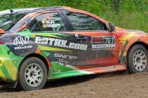 Sumit Panjabi / Nitan Jacob Mitsubishi Lancer Evo X limps through a sharp left on SS3, Steamboat I.