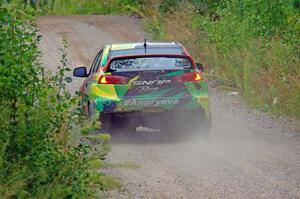 Sumit Panjabi / Nitan Jacob Mitsubishi Lancer Evo X limps through a sharp left on SS3, Steamboat I.