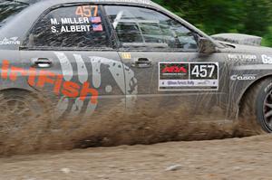 Sam Albert / Michelle Miller Subaru WRX STi at a sharp left on SS3, Steamboat I.