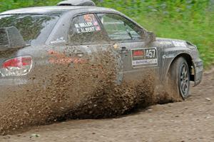 Sam Albert / Michelle Miller Subaru WRX STi at a sharp left on SS3, Steamboat I.