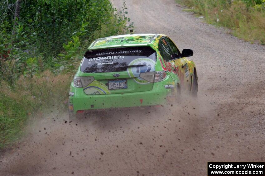 Lauchlin O'Sullivan / Scott Putnam Subaru WRX STi through a sharp left on SS3, Steamboat I.