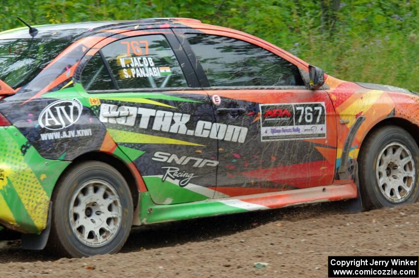 Sumit Panjabi / Nitan Jacob Mitsubishi Lancer Evo X limps through a sharp left on SS3, Steamboat I.