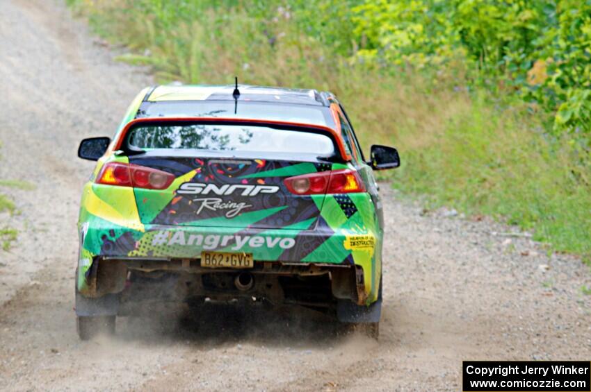 Sumit Panjabi / Nitan Jacob Mitsubishi Lancer Evo X limps through a sharp left on SS3, Steamboat I.