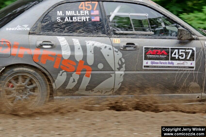 Sam Albert / Michelle Miller Subaru WRX STi at a sharp left on SS3, Steamboat I.