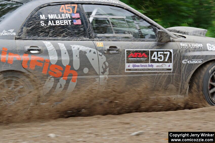 Sam Albert / Michelle Miller Subaru WRX STi at a sharp left on SS3, Steamboat I.