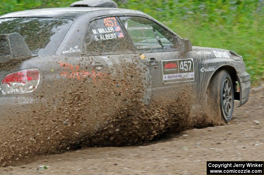 Sam Albert / Michelle Miller Subaru WRX STi at a sharp left on SS3, Steamboat I.