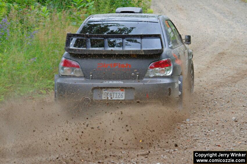 Sam Albert / Michelle Miller Subaru WRX STi at a sharp left on SS3, Steamboat I.