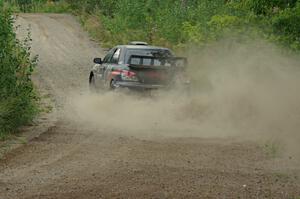 Sam Albert / Michelle Miller Subaru WRX STi at a sharp left on SS3, Steamboat I.