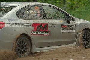 Travis Nease / Krista Skucas Subaru WRX STi at a sharp left on SS3, Steamboat I.