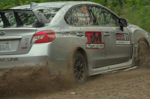 Travis Nease / Krista Skucas Subaru WRX STi at a sharp left on SS3, Steamboat I.