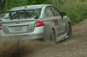 Travis Nease / Krista Skucas Subaru WRX STi at a sharp left on SS3, Steamboat I.