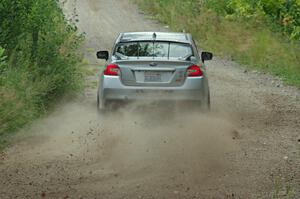 Travis Nease / Krista Skucas Subaru WRX STi at a sharp left on SS3, Steamboat I.