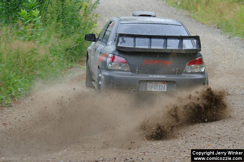 Sam Albert / Michelle Miller Subaru WRX STi at a sharp left on SS3, Steamboat I.