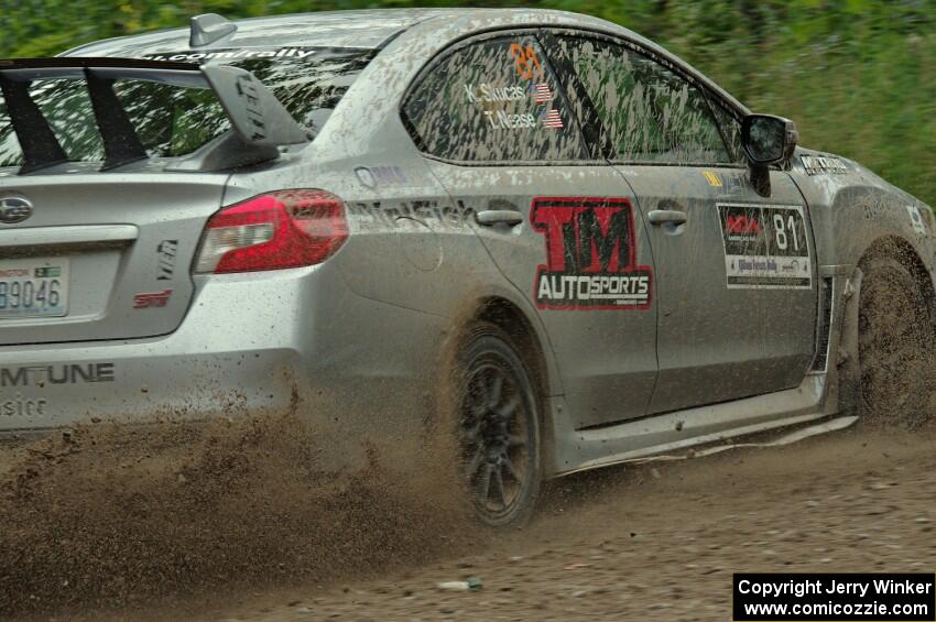 Travis Nease / Krista Skucas Subaru WRX STi at a sharp left on SS3, Steamboat I.