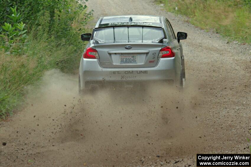 Travis Nease / Krista Skucas Subaru WRX STi at a sharp left on SS3, Steamboat I.