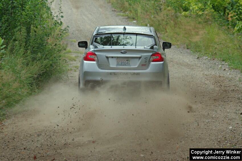 Travis Nease / Krista Skucas Subaru WRX STi at a sharp left on SS3, Steamboat I.