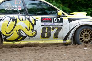 Mark Williams / Ben Peterson Subaru WRX STi at a sharp left on SS3, Steamboat I.