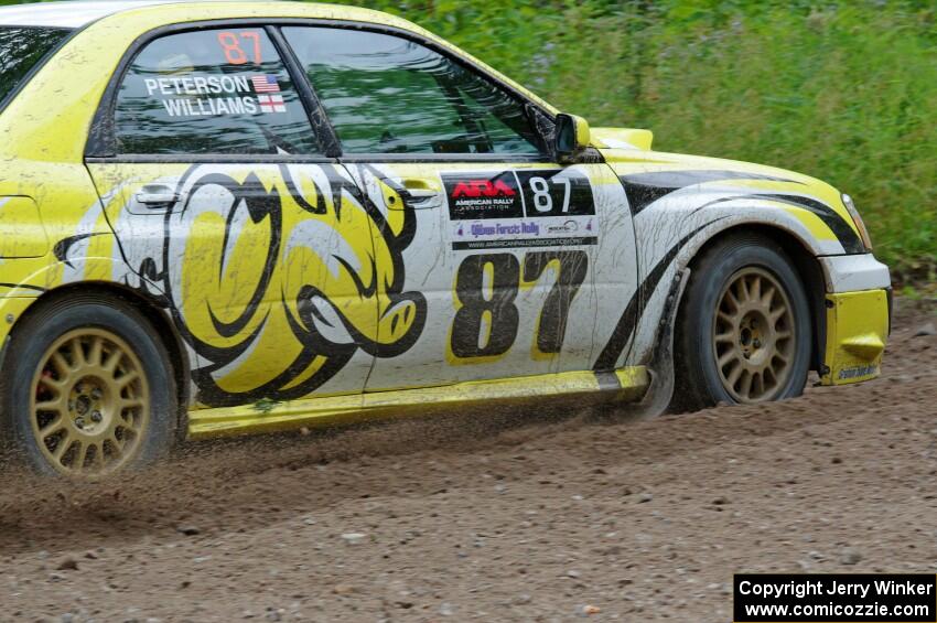 Mark Williams / Ben Peterson Subaru WRX STi at a sharp left on SS3, Steamboat I.