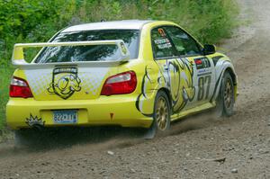 Mark Williams / Ben Peterson Subaru WRX STi at a sharp left on SS3, Steamboat I.