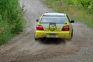 Mark Williams / Ben Peterson Subaru WRX STi at a sharp left on SS3, Steamboat I.