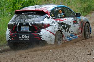 Dennis Romero / Jose Maria Rodriguez Subaru WRX STi  at a sharp left on SS3, Steamboat I.