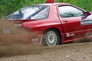 Al Dantes, Jr. / Brandon Snyder Mazda RX-7 Turbo at a sharp left on SS3, Steamboat I.