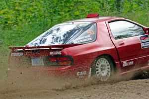 Al Dantes, Jr. / Brandon Snyder Mazda RX-7 Turbo at a sharp left on SS3, Steamboat I.