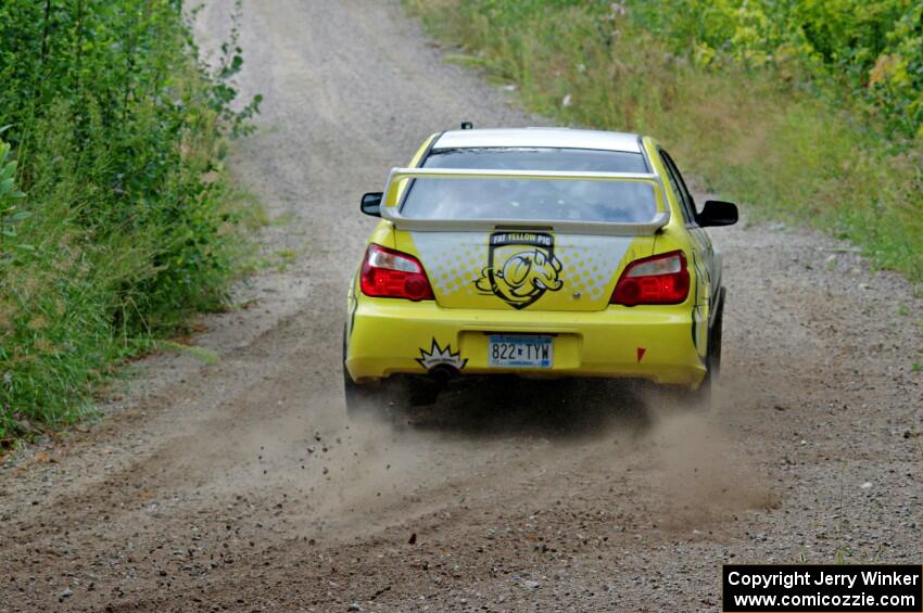 Mark Williams / Ben Peterson Subaru WRX STi at a sharp left on SS3, Steamboat I.