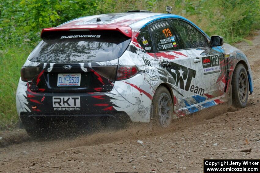 Dennis Romero / Jose Maria Rodriguez Subaru WRX STi  at a sharp left on SS3, Steamboat I.