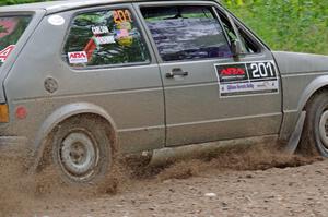 Adam VanDamme / Jake Carlson VW Rabbit at a sharp left on SS3, Steamboat I.