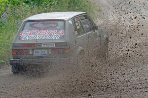 Adam VanDamme / Jake Carlson VW Rabbit at a sharp left on SS3, Steamboat I.