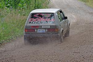 Adam VanDamme / Jake Carlson VW Rabbit at a sharp left on SS3, Steamboat I.