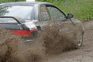 Kristian Rue / Mark Rue Subaru Impreza 2.5RS at a sharp left on SS3, Steamboat I.