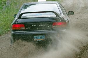 Kristian Rue / Mark Rue Subaru Impreza 2.5RS at a sharp left on SS3, Steamboat I.