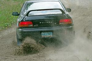 Kristian Rue / Mark Rue Subaru Impreza 2.5RS at a sharp left on SS3, Steamboat I.