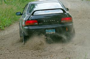 Kristian Rue / Mark Rue Subaru Impreza 2.5RS at a sharp left on SS3, Steamboat I.