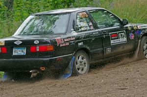 Jerry Rengo / Greg Hanka Nissan Sentra SE-R at a sharp left on SS3, Steamboat I.