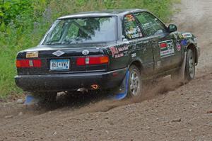 Jerry Rengo / Greg Hanka Nissan Sentra SE-R at a sharp left on SS3, Steamboat I.